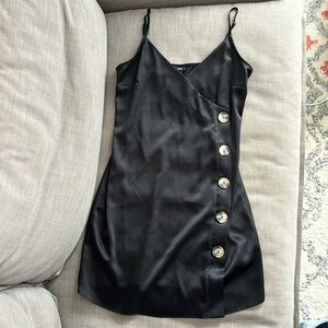 Black mini dress with button detail